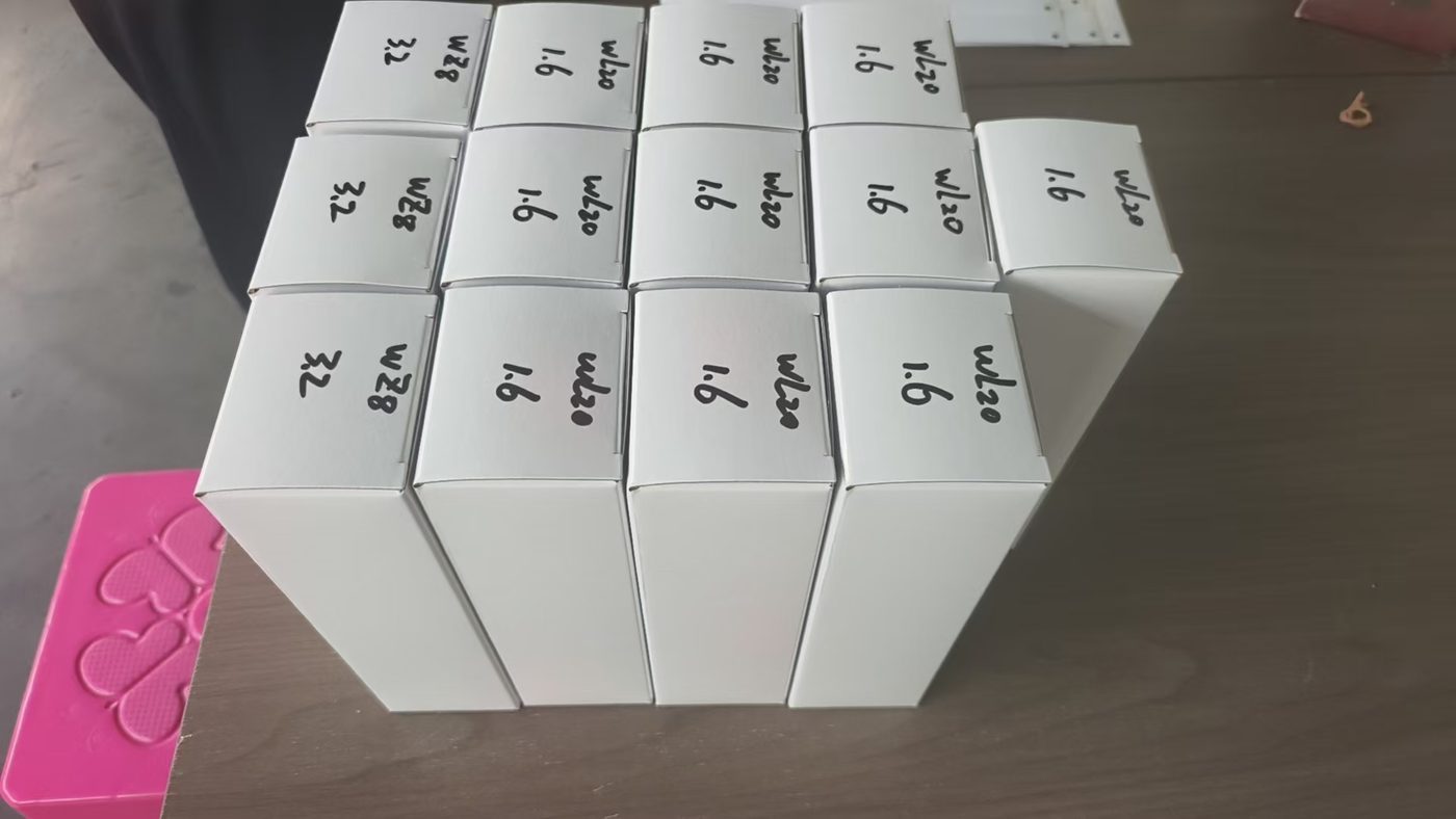 Cartons of WL20 1.6 mm and WZ8 3.2 mm electrodes stacked on a table before loading